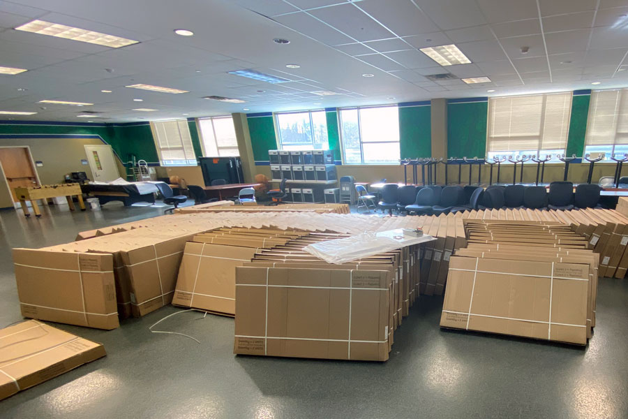 Cartons of LED lights are being stored in the Shiel Student Life Center before they are installed throughout the campus. 