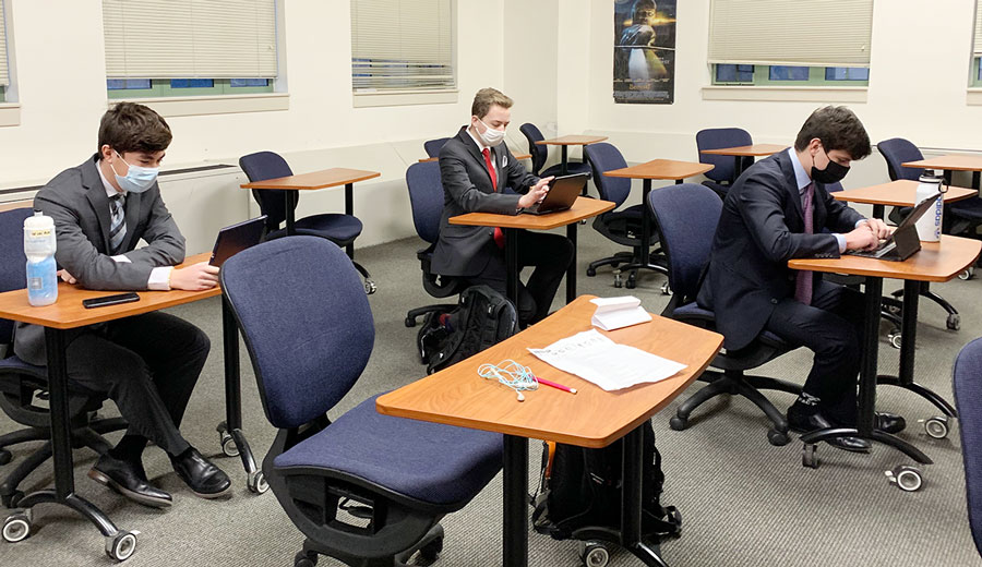 Speech and debate team members got an early start in Loretto Hall during the State meet. 