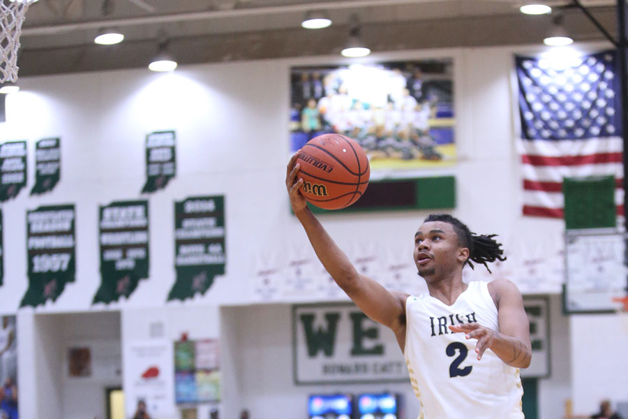 During the City tournament championship game, senior Vincent Brady gets loose for two points. The Irish won the City title with a 69-59 win over Crispus Attucks. The team now heads into Sectional play, taking on Lawrence North on March 3 at Tech. 