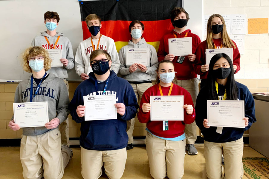 Students show off their awards from the National German Examination. They are, front row, from left, Micah Wasmuth, Phillip Bernauer, Claire Miller and Jasmine Zimmer; back row, Alex Pohl, Hans Klemm, Matthew Fiedeldey, Tom Kress and Emma Kress. 