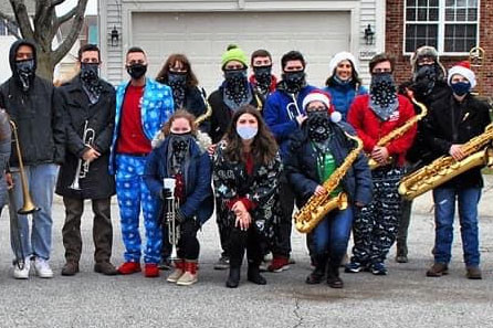 Drum major senior Gabe Tice and several members of the jazz band played Christmas music in various neighborhoods to help fulfill their service hours this year. 