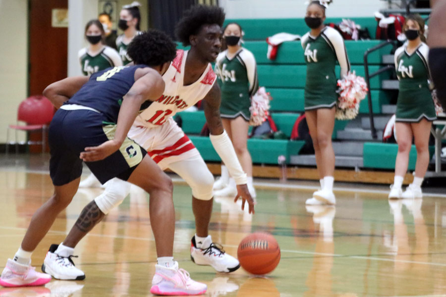 The men's basketball team, shown in action during the first game of the Sectional, will play in the Hall of Fame Classic at New Castle next season. 