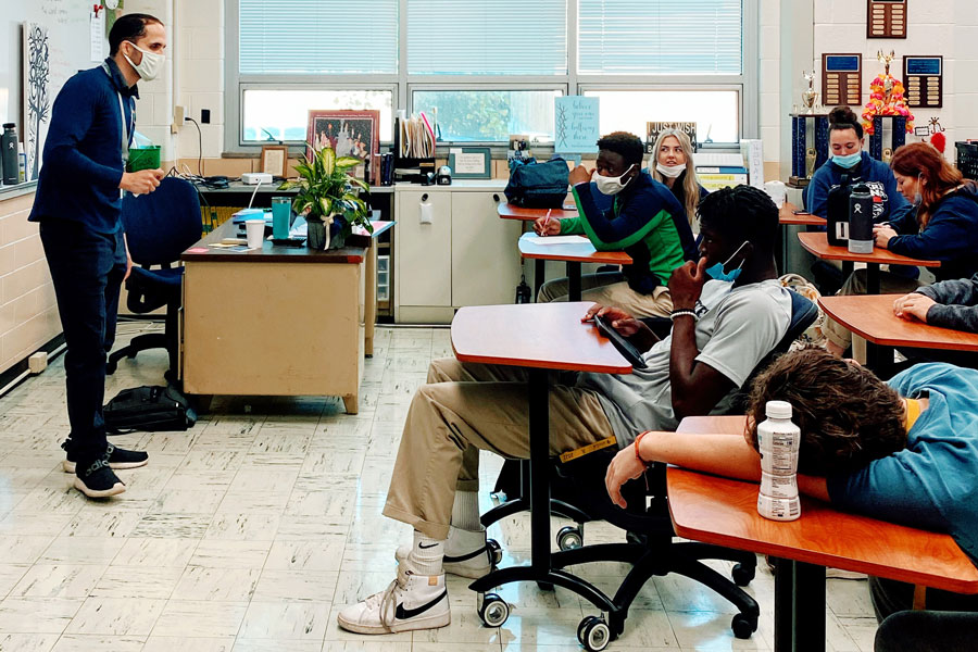 During E period on Sept. 16, Mr. Vinny Corsaro ‘14 instructs a religion course in Kelly Hall. Corsaro provided his perspective on what it’s like to return to the Hill as a teacher after graduating seven years ago. 