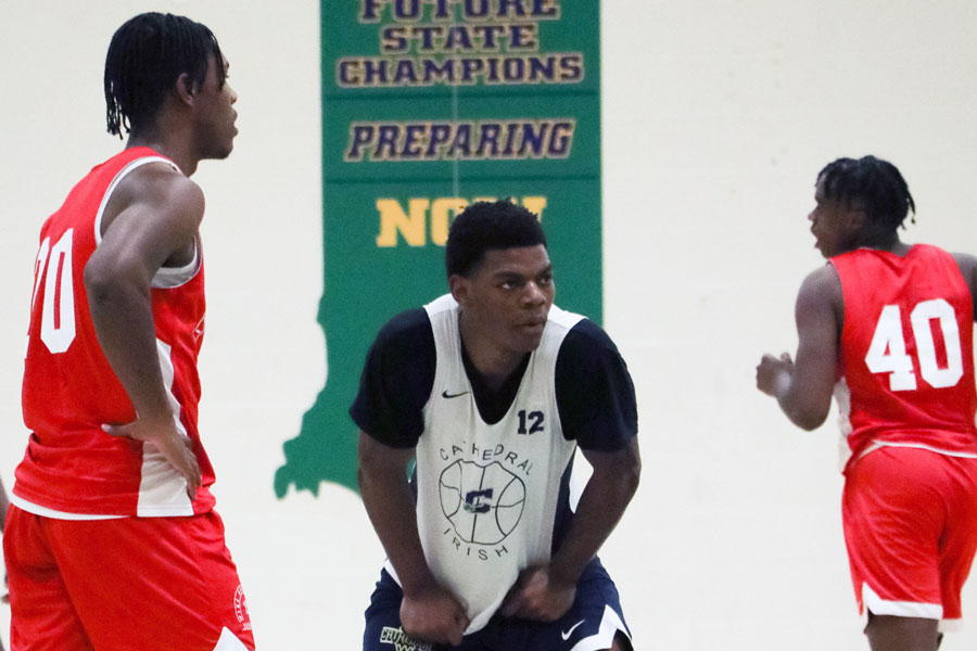 Senior Tayshawn Comer (12) plays defense during the team's scrimmage against Pike on Nov. 18.