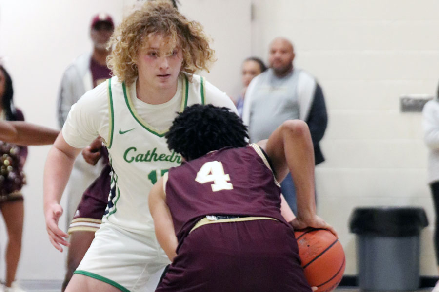 Jake Davis plays in-your-face defense against Brebeuf Jesuit during the team's home opener on Dec. 3. 