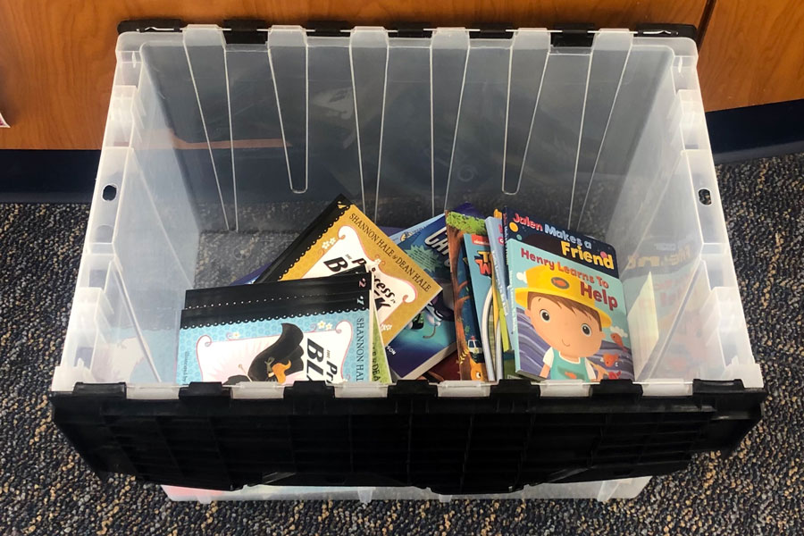 Students should place their donated books in the box located in front of the library desk. 