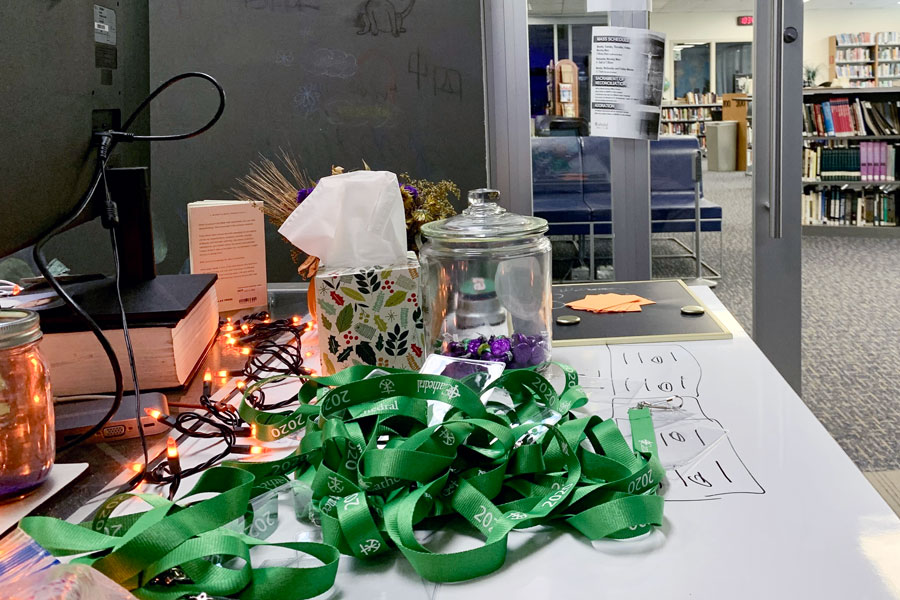 Mrs. Gara Schommer’s desk is the temporary home for green lanyards until a shipment of 1,000 new freshman lanyards arrives from overseas. 
