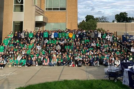 Shadows and their hosts gather at the main entrance during the shadow sibling day earlier this semester. 