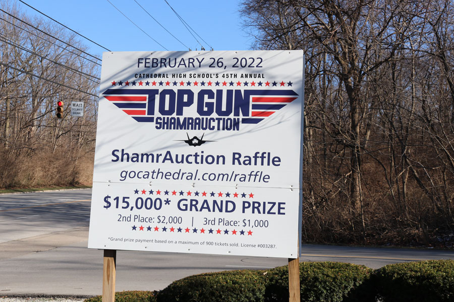 A sign at the bottom of the Hill provides information about this year's ShamrAuction.