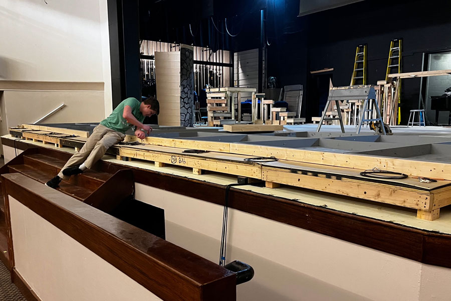 During E period on March 7, sophomore Paul Sheddy works on the set for the upcoming production of "Into the Woods."