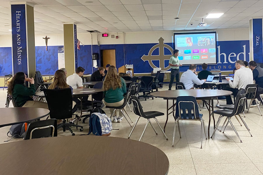 At the most recent forum on the crisis in Ukraine, social studies teacher Mr. Craig Blanchet presents information to students. 