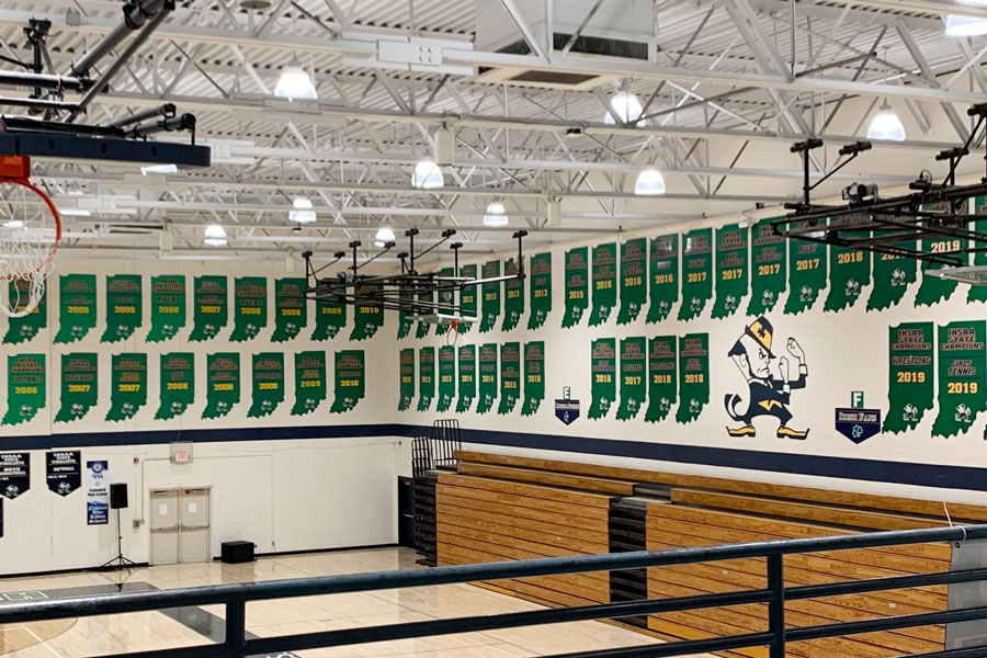 State champion plaques line the wall of the Welch Activity Center. 