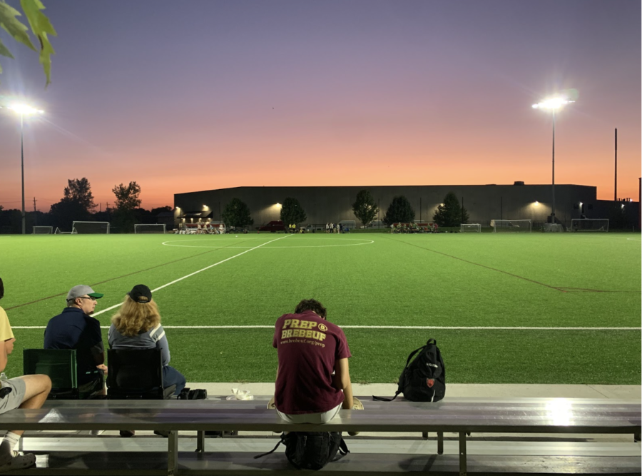 The Cathedral and Brebeuf women’s soccer teams come together at halftime to discuss their plans for the rest of the game.