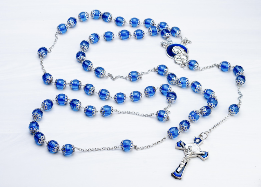 A beautiful blue rosary, the inspiration for today's schedule and school wide prayer activity.