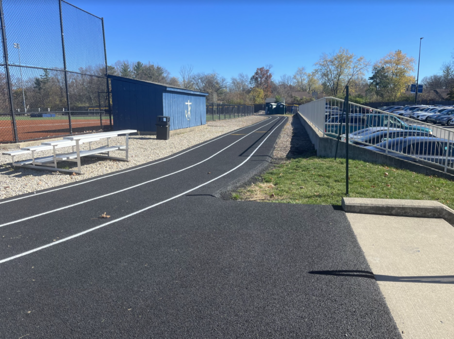 The track will be covered with snow soon enough, but runners are get in as much work as they can before the winter.