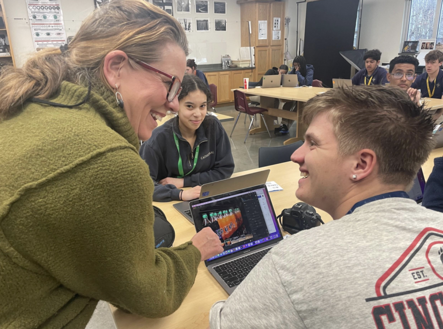 Mrs. Desautels and senior Alec Irwin discuss the project.