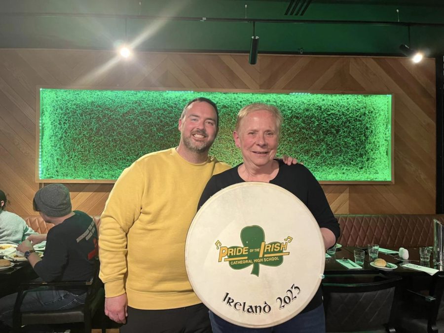 Kathy McCullough receives a special drum from Chris Forsythe, Cathedral's Music Travel Tour Guide on their recent trip to Ireland.