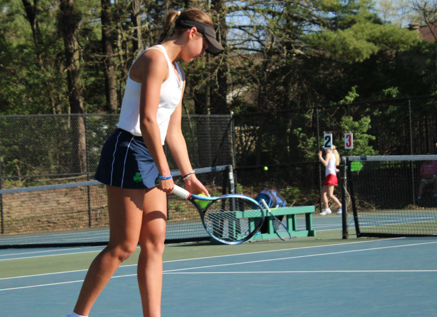 Tess Wojtalik (Junior) winds up her serve to begin the Girl's Tennis first home-opener of the season. Tess defeated her opponent, and was one of two players to actually beat the Tigers of Fishers High School in a singles match that evening. Girl's Tennis head coach Jeff Giles is very optimistic about the season, stating, "Fishers is ranked number two in the state and have a very strong group of singles players. This is the first matchup of the year and would like to make a good first impression for the season."