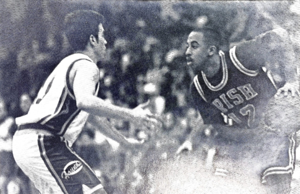 From the 1995 Cathedran, "Senior guard Micah Shrewsberry overlooks his weaker competition en route to another assist. He was one of the area's leaders in this category."