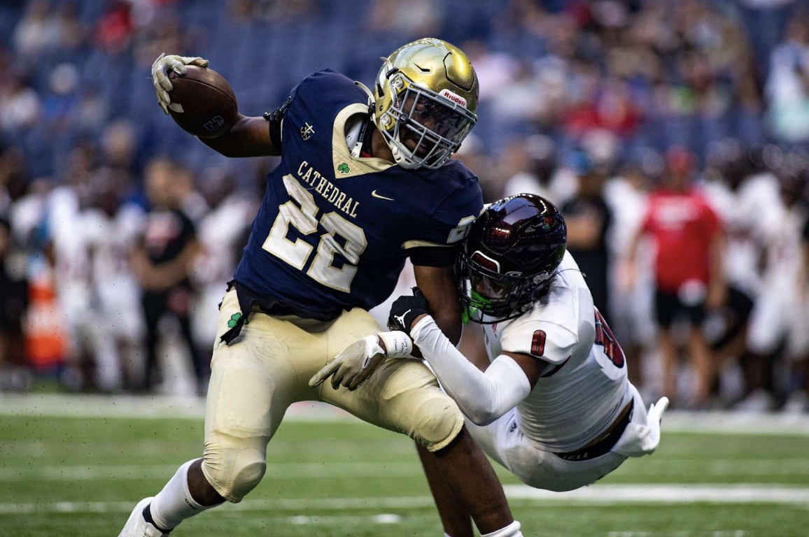 Junior Jalen Bonds breaking a tackle from the Lafayette attacker. Bonds had 5 carries for 54 yards.