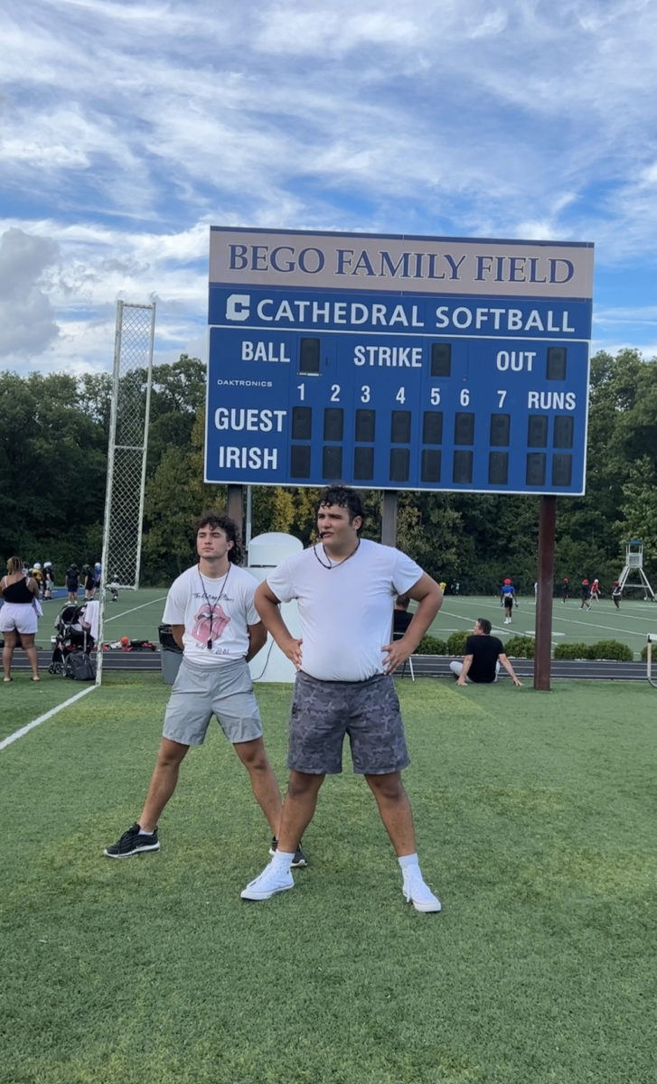 Pink Panthers Head Coaches, William Neale and Danny O’Neil, stand confident as they coach their teams during a Powder Puff practice