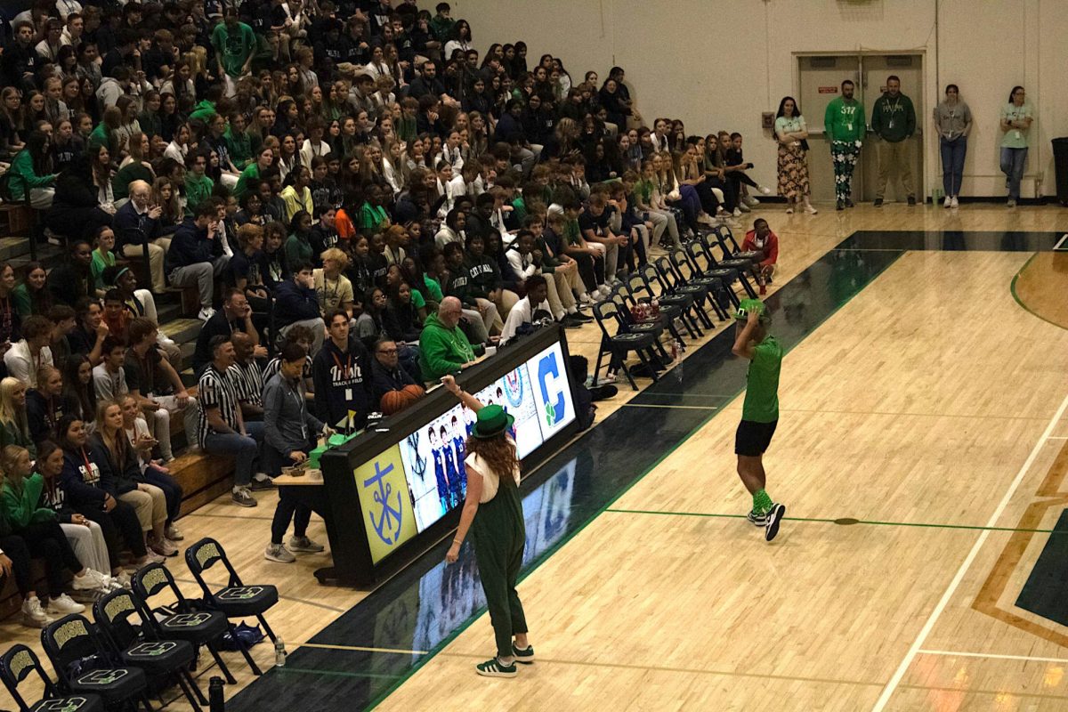 Mary Murphy and Dana Hyde have their first opportunity to hype up the crowd. During the intramural game, they were able to lead the juniors and frehmen in the cheer.