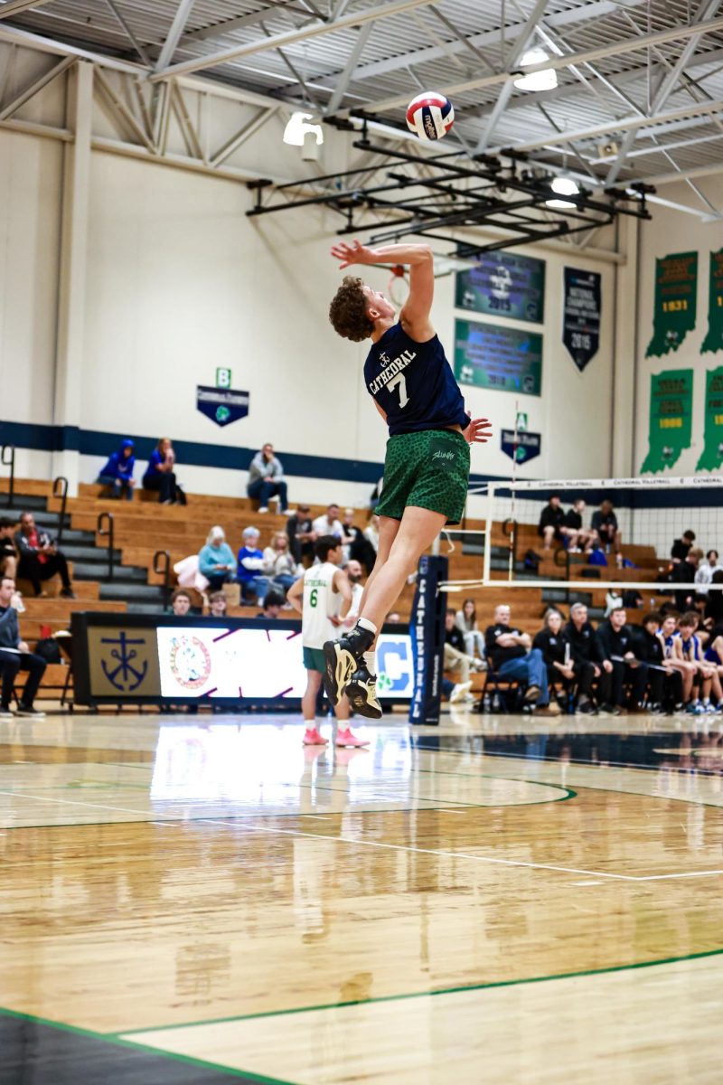 Senior Lincoln Heiser serves the ball to the opponent on March 27. Heiser is a two year starter and leads the team in numerous statistics. He said, “I do think this team has what it takes to win state and if not we are very close.” 