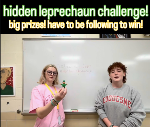 Isabella Caldwell and Clare Meschi present the mini leprechaun that will be hidden for the challenge. The leprechauns introduce the challenge and the first lead on their instagram page. “I love challenges, so why not make one for students? Good luck to them!” Cadwell ‘26 shared. 
Photo from Cathedral Leps Instagram.