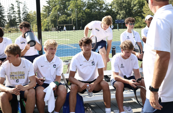 Cathedral Boys Tennis gets words of advice from Head Coach Jeff Giles. The team dominated in the city and sectional championship, barely losing a set. Wojtalik said, “We met a lot of our goals this season individually as well as a team with city, sectional and regional championships.”