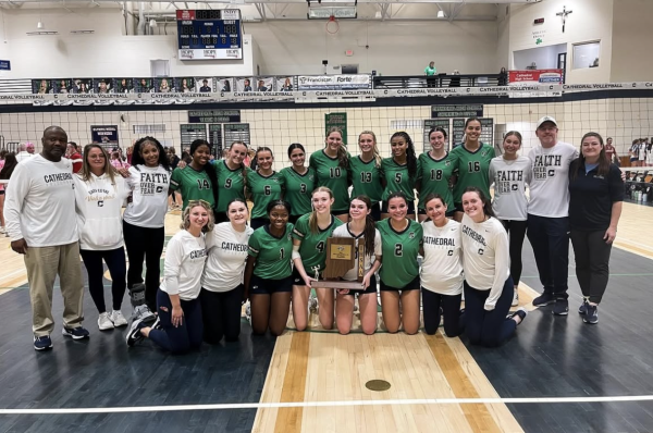 The Lady Irish pose for a photo post game, claiming the Sectional title. A majority of the players, despite being faced with illnesses, powered through to take this title. Quenichet said, “ Being a Sectional champion is not something that everyone can say they have done. We can now say that, and we are grateful, but we are also not finished yet!” 