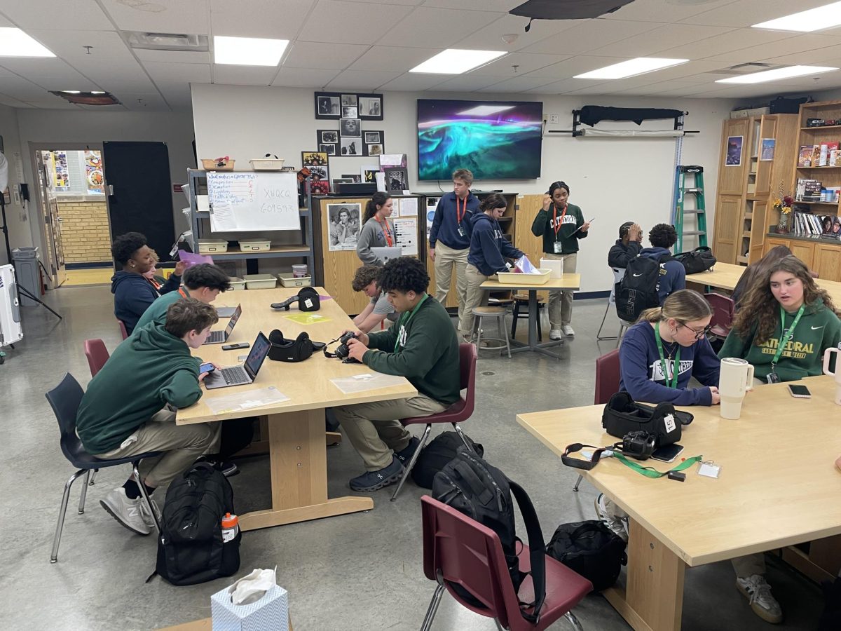 Students in Digital Photography assemble cameras and log in to their computers. Photography is one of the many classes that gives students real opportunities in experiential learning. Photography educator Marc Quaranta said, "Students spend so much of their time in class independently working, teaching each other, and getting out of the classroom to explore new skills and passions."